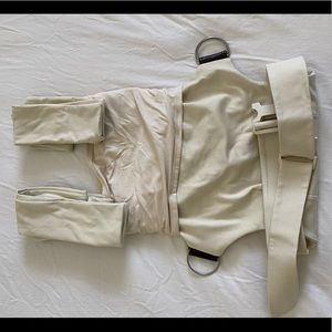 Brand new baby carrier. Never used. Stretchy and buttery soft for you and baby.